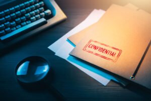 Private,Investigator,Desk,With,Confidential,Envelopes